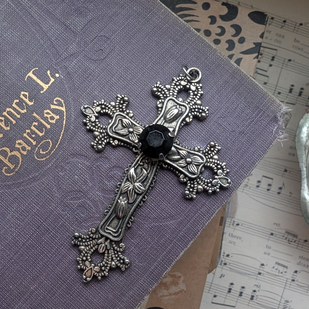 Ornate Silver Tone Filigree Cross with Black Accent Charm